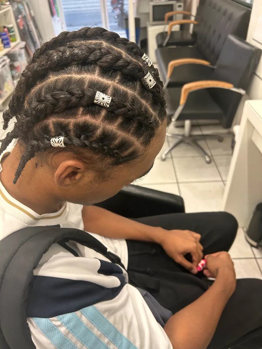Nattes plaquées, réalisé au salon Cosmetex