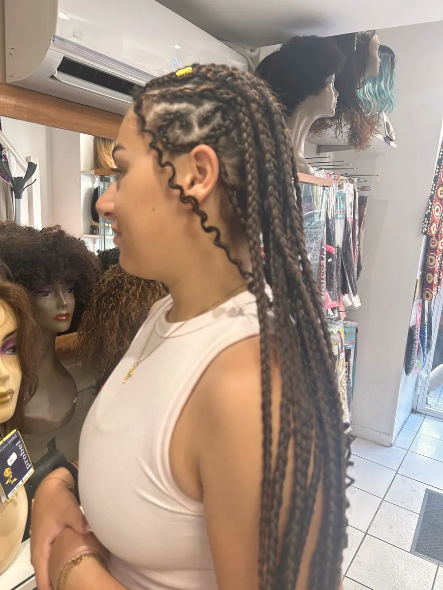 Nattes et tresses, réalisé au salon Cosmetex